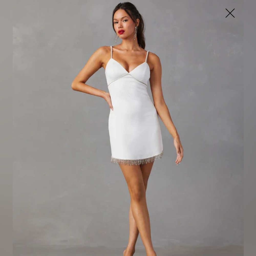 Lena white mini dress with Rhinestone Embellished Bust &
Rhinestone Fringe Hem